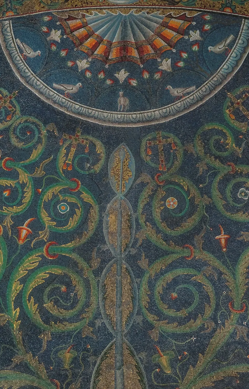 A mosaic of gold and red scrolling tendrils on a deep blue-green ground, rising from a central stem towards a half-circle above with small white birds and a fan-shaped motif.