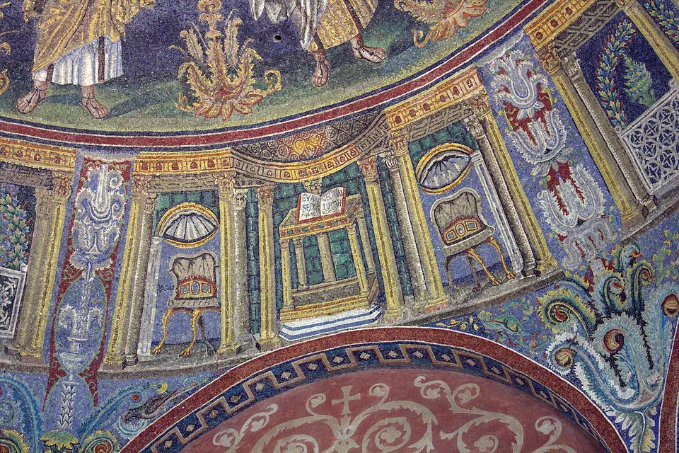 A curved band of mosaic on a blue ground divided by painted columns. In one compartment an empty chair with a cushion stands under a shell-shaped canopy; in the next, an open book lies on a small table; green garden plants fill the spaces between.
