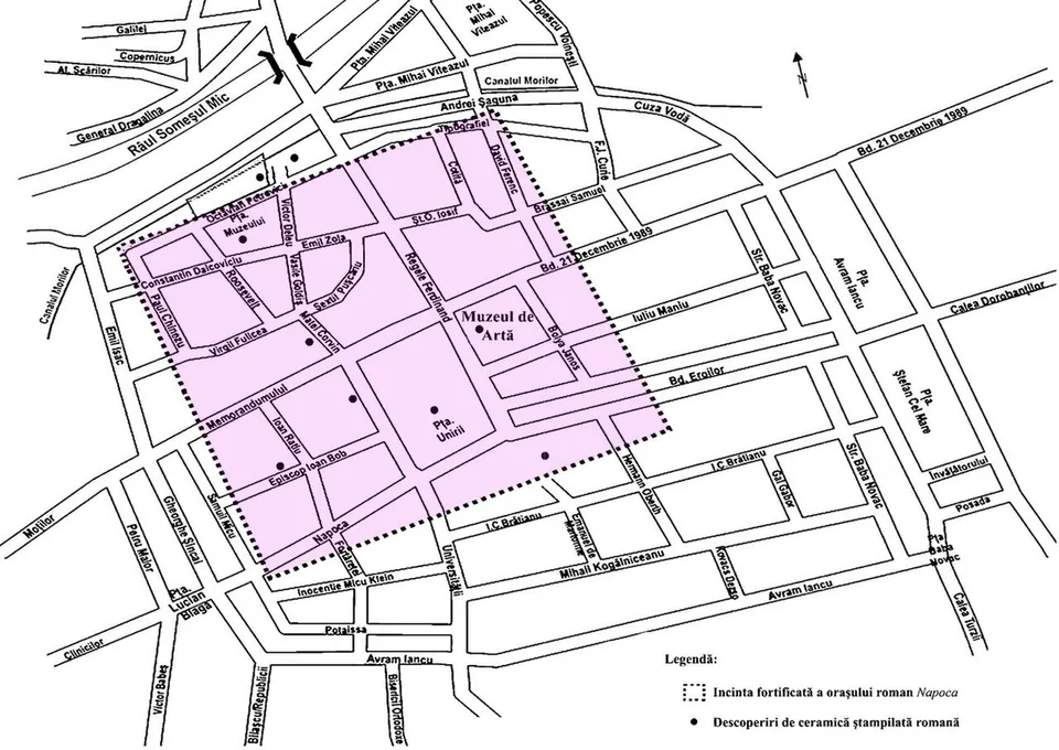 A street plan of central Cluj with a shaded rectangle marking the walled Roman town and dots for finds of stamped Roman pottery.