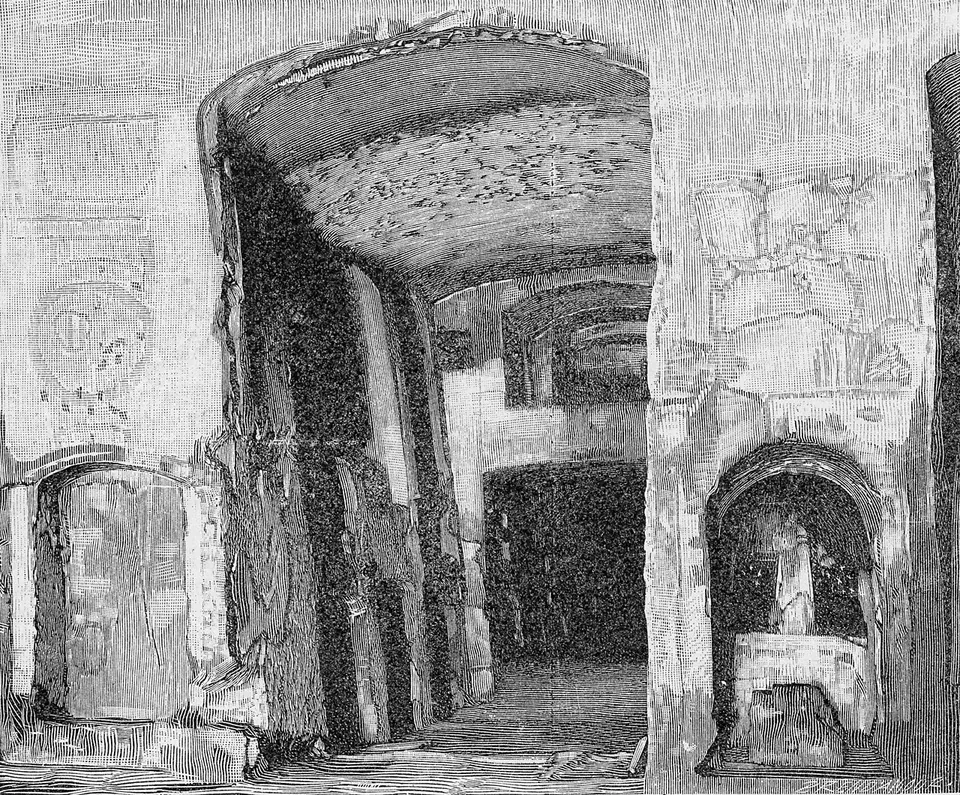 A black-and-white engraving of a long, vaulted underground corridor, with arched niches opening off both sides, faint painted decoration on the walls, and light at the far end.