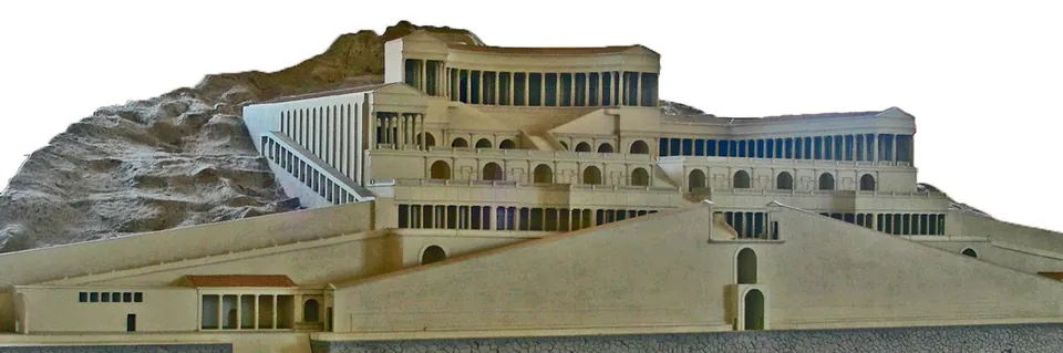 A pale scale model of a hillside complex, its terraces stepping up the slope and joined by stairways and ramps to a colonnaded court and a semicircular structure at the top.